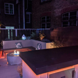 ClaudiCemento microcement installation and garden deign by World Land Design. Outdoor Kitchen