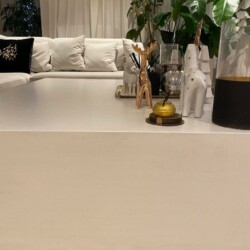 ClaudiCemento off white microcement installed on a custom, hand made coffee table installed by SOBO. Furniture - table