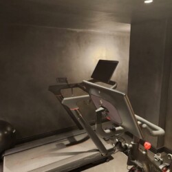 ClaudiCemento microcement dark grey on the floors, walls, ceilings installed by SOBO. Gym