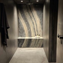ClaudiCemento microcement dark grey on the floors, walls, ceilings installed by SOBO. Bathroom