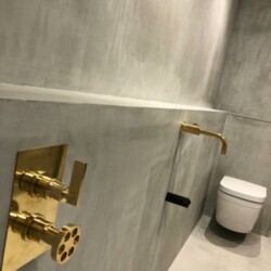 ClaudiCemento microcement on the floors, walls, ceilings installed by Lukasz - 07784989756. Bathroom