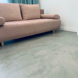 ClaudiCemento microcement on the floors installed by SOBO. Living room