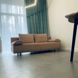 ClaudiCemento microcement on the floors installed by SOBO. Living room