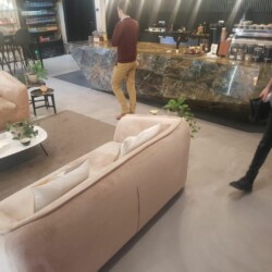 ClaudiCemento microcement on the floors installed by SOBO. Commercial - restaurant