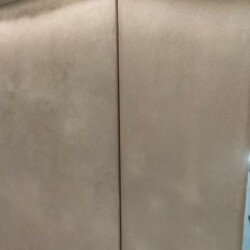 ClaudiCemento microcement installation on walls and doors.