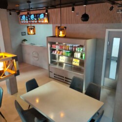 ClaudiCemento microcement deck on the walls and fridge installed by SOBO. Commercial - restaurant
