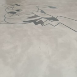 ClaudiCemento microcement deck with stainless steel inlay  installed by SOBO. Commercial - office floor